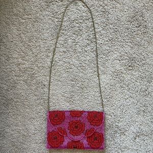 Lulu’s red and pink floral purse!! Only used once and it’s SO PRETTY!